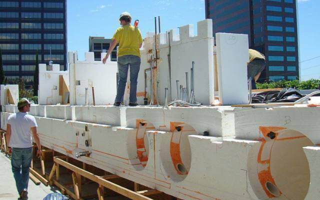 Crew fabricating SABS foam hull sections